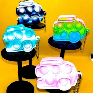 NWOT - 4 Happy Camper Popit Keychains!!!